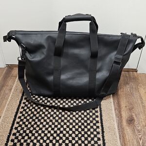 Rains Black Duffel Bag for Men